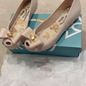 Vivienne Westwood Cream Flats with Bow Accent